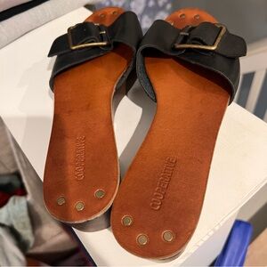 Cooperative Black Leather Buckle Slide Mules with Tan Footbed